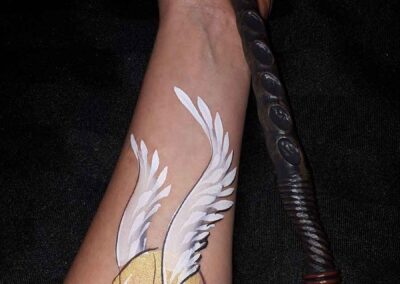 golden snitch face painting